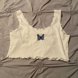 White crop top with blue butterfly